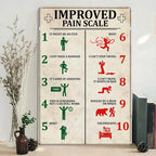 Vintage tin sign with humorous improved pain scale chart, displayed on a shelf with decorative plants.