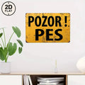 Vintage yellow tin sign with black text 'POZOR! PES' on wall, retro home decor