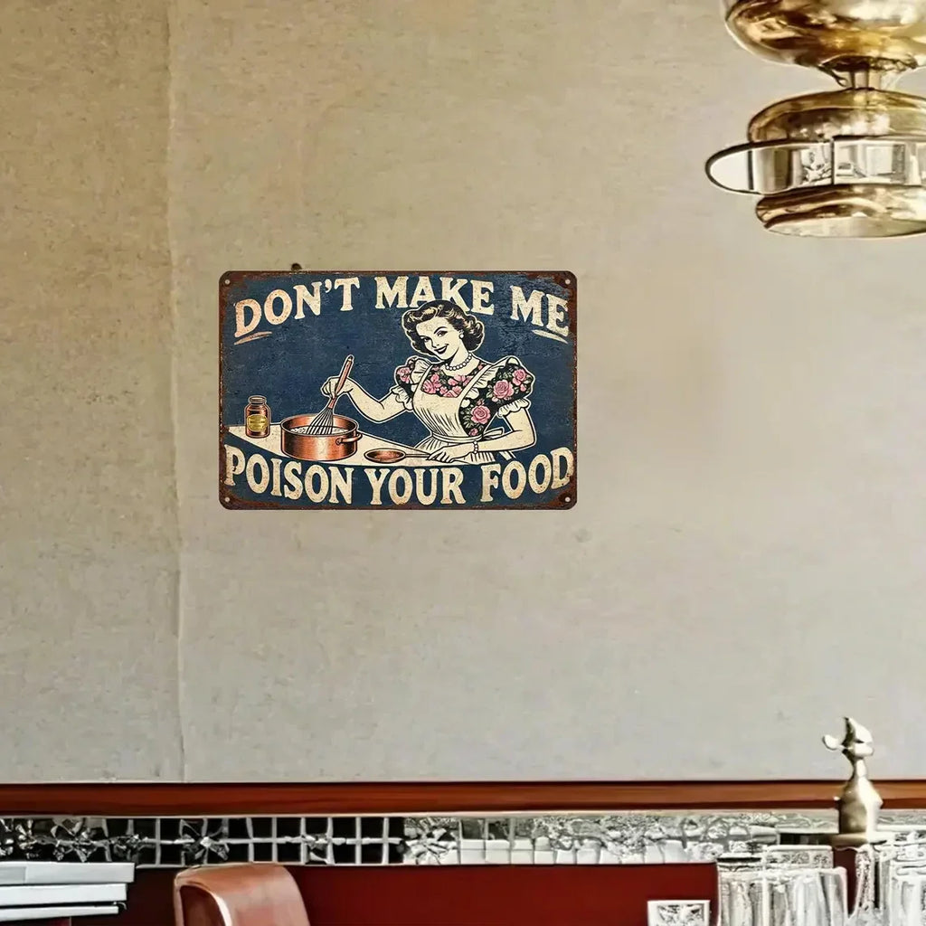 Vintage tin sign with retro woman cooking and humorous 'Don’t make me poison your food' quote, wall decor
