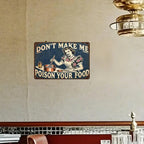 Vintage tin sign with retro woman cooking and humorous 'Don’t make me poison your food' quote, wall decor