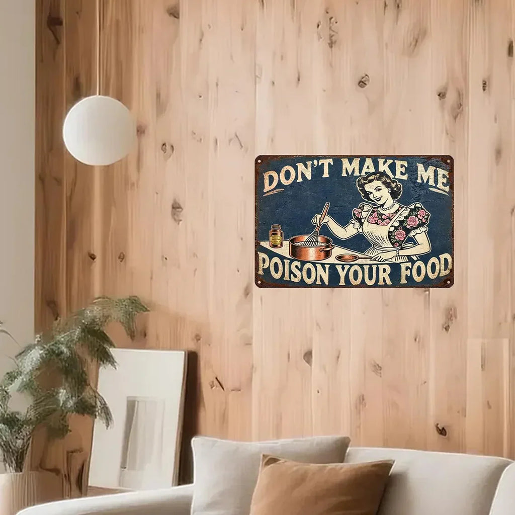 Vintage tin sign with retro woman cooking and funny quote on wooden wall in cozy living room