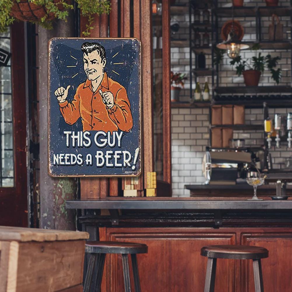 Funny "This Guy Needs a Beer" Vintage Metal Sign: Bar, Man Cave Decor