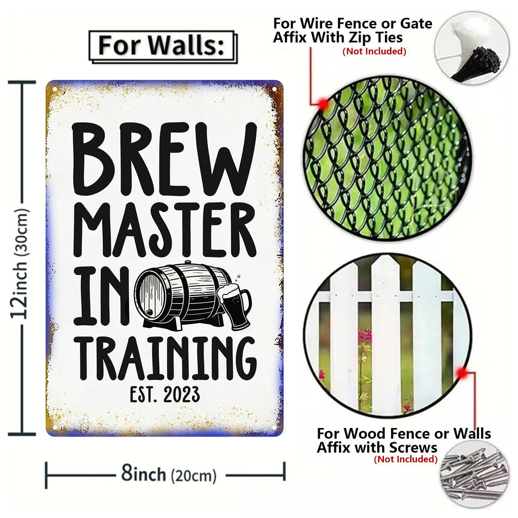 Brew Master In Training Metal Wall Sign with Beer Barrel Graphic for Home Bar, Kitchen or Man Cave Decor