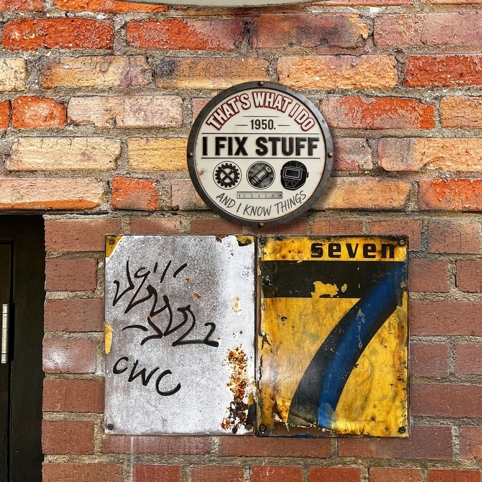 Vintage 1950s Handyman Metal Wall Sign with 'That's What I Do I Fix Stuff' Text and Tool Icons for Workshop or Garage Decor