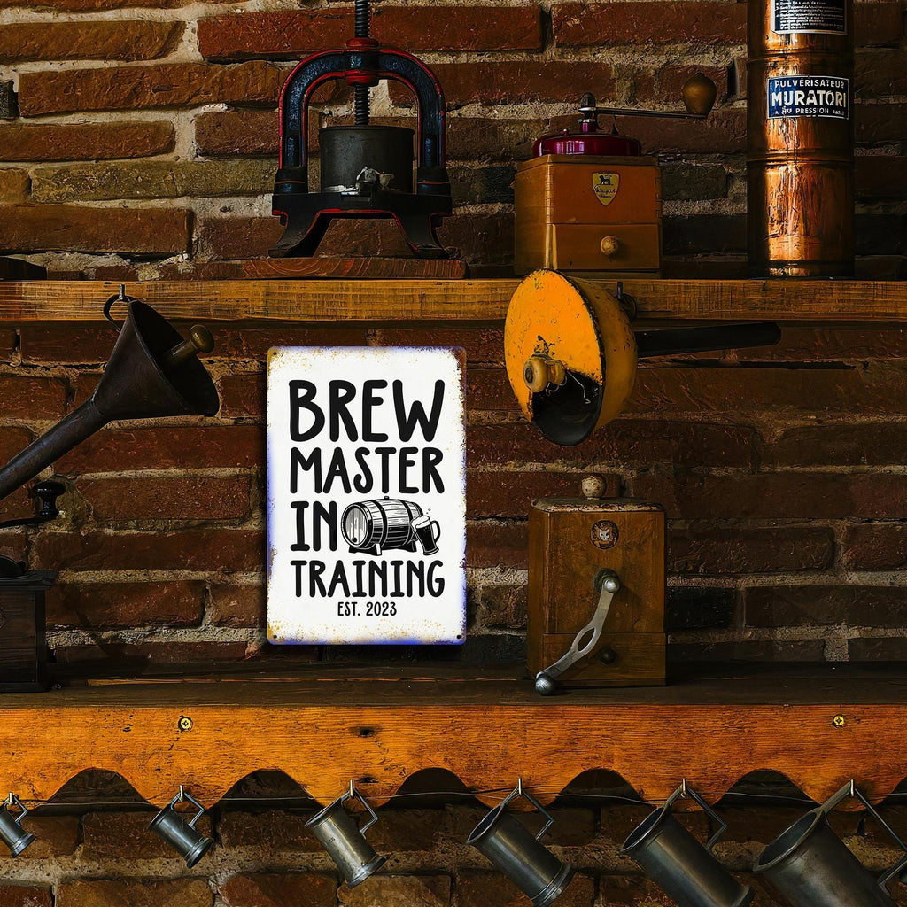 Brew Master In Training Metal Wall Sign with Beer Barrel Graphic for Home Bar, Kitchen or Man Cave Decor