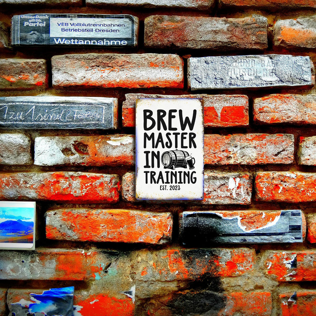 Brew Master In Training Metal Wall Sign with Beer Barrel Graphic for Home Bar, Kitchen or Man Cave Decor